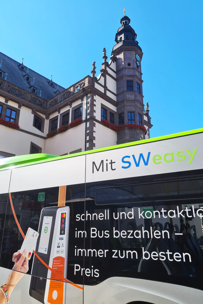 Passenger using contactless EMV card on krauth validator in Schweinfurt